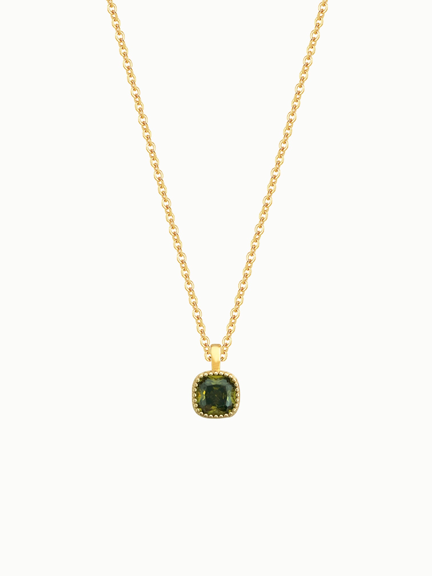 FAVES Gemma necklace with cushion-cut green cubic zirconia pendant, 18K gold layered brass chain.