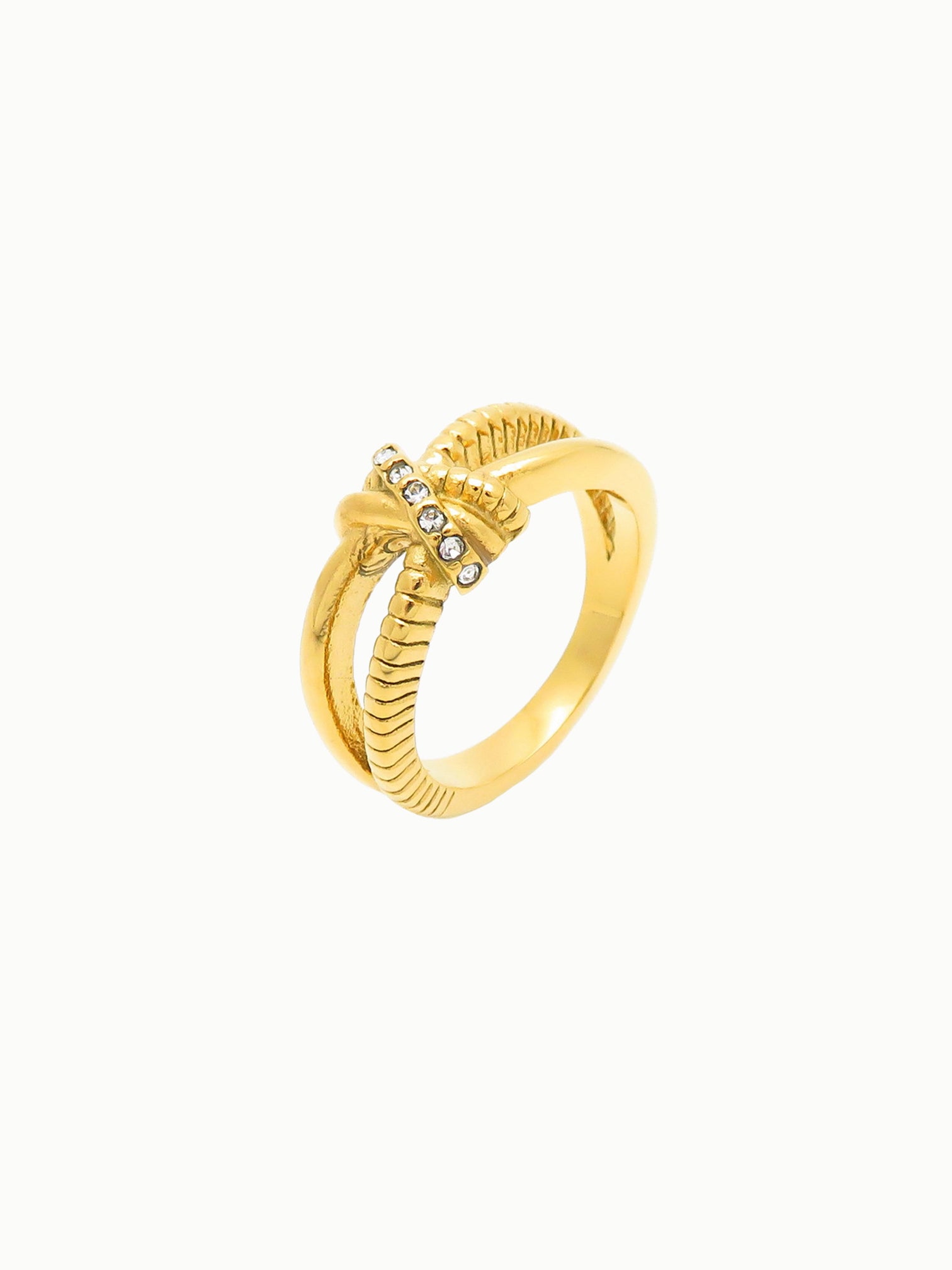 FAVES Kalla Ring featuring intertwined 18K gold band with textured details and cubic zirconia accents
