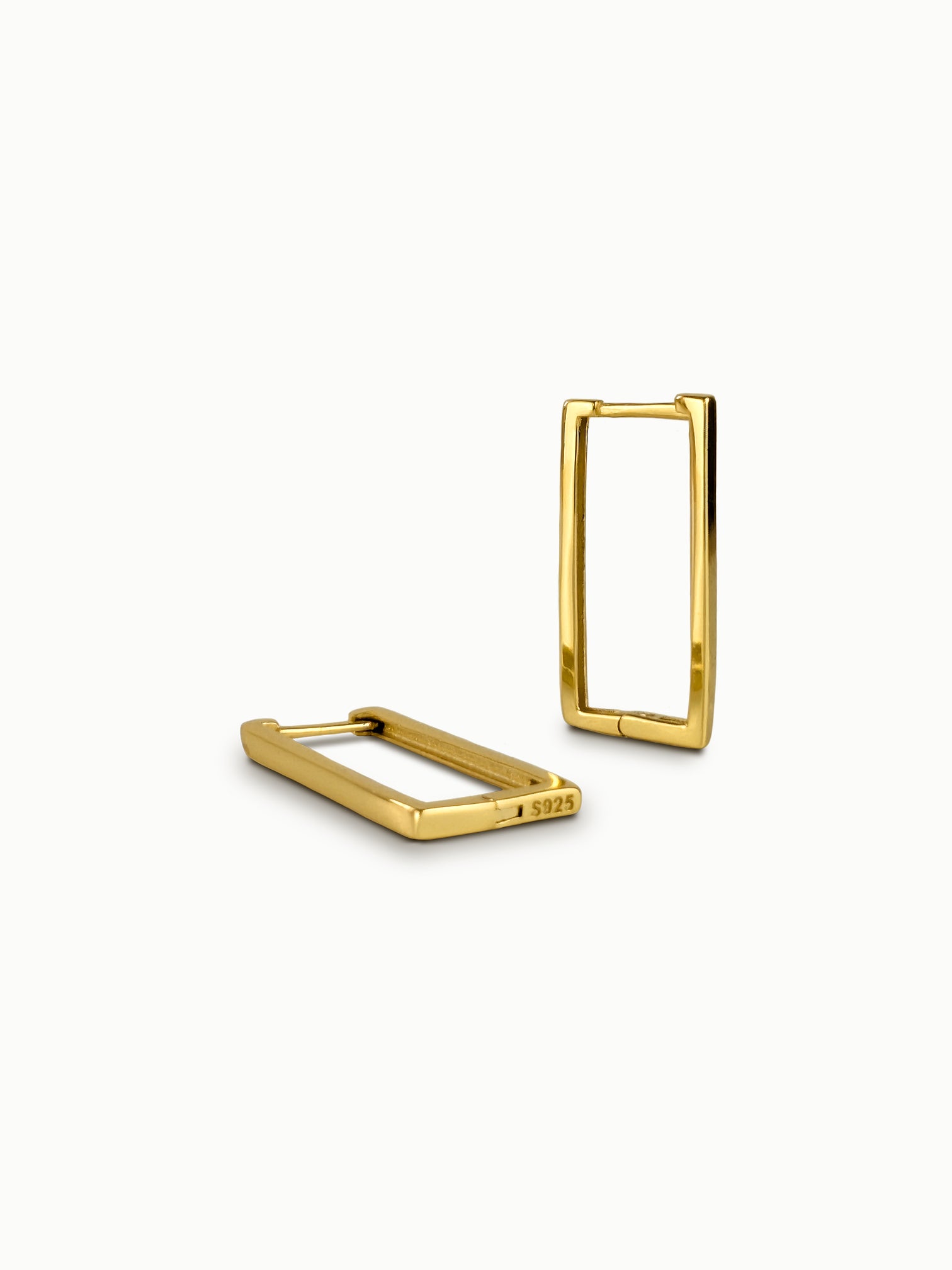 Kirsten rectangular gold hoop earrings laid flat showing minimalist design
