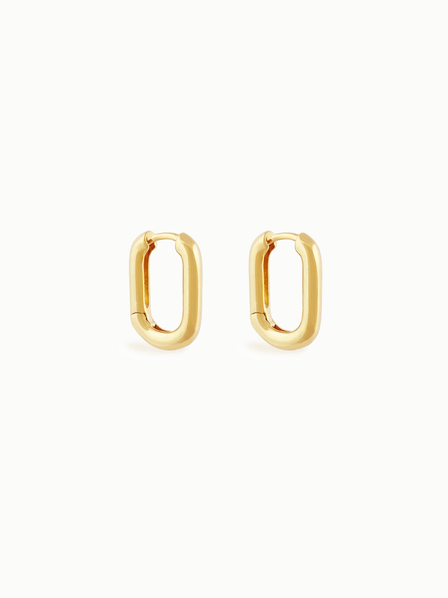 FAVES Hali oval huggie hoop earrings in 18K gold plated sterling silver front view