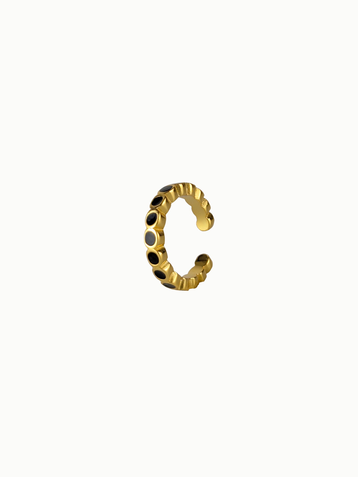 Side view of FAVES Noir adjustable ear cuff, 18K gold plated sterling silver with black enamel accents