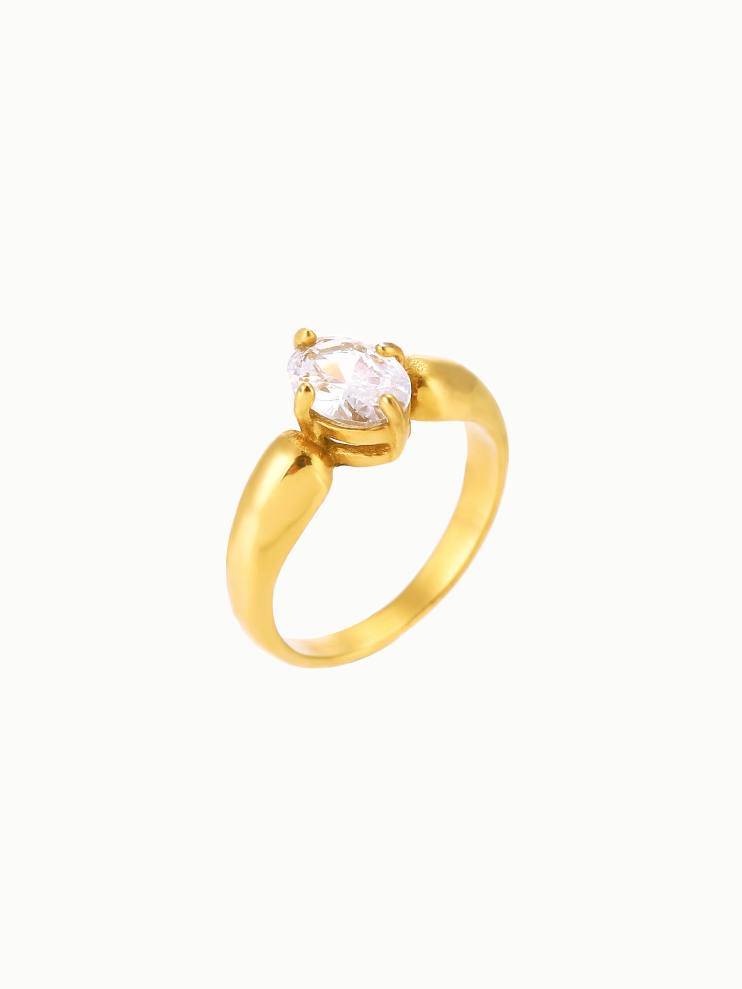 FAVES Katella Ring – 18K gold plated titanium steel band with oval white cubic zirconia solitaire, prong setting