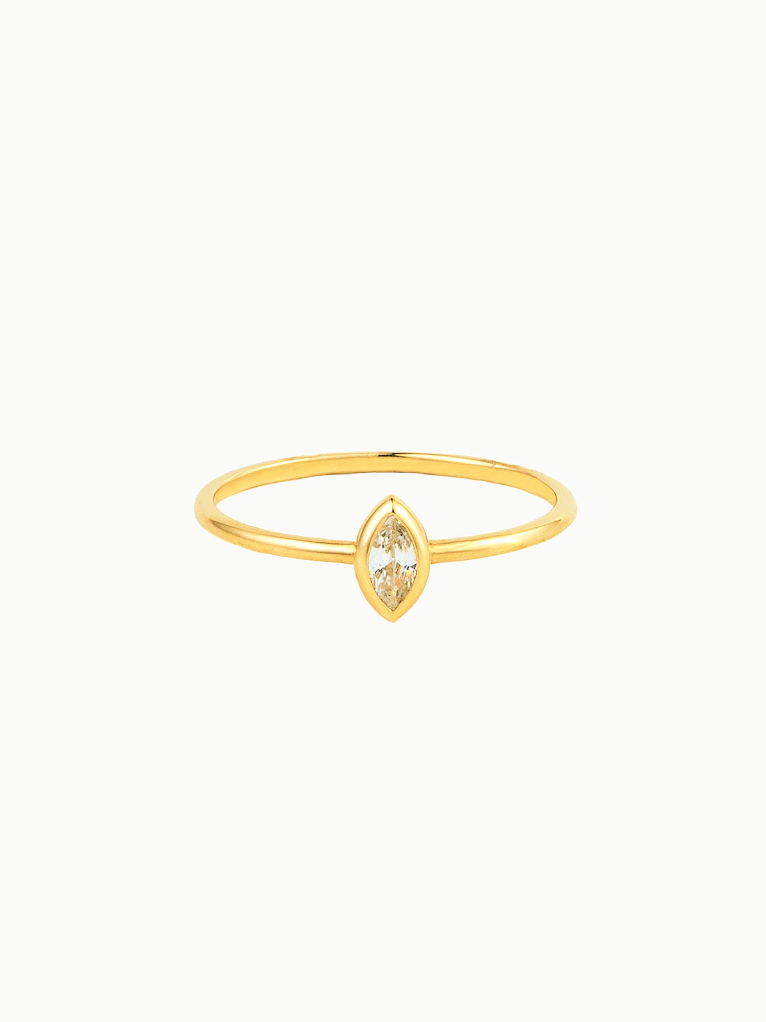 FAVES Isla marquise cubic zirconia ring in 18K gold over titanium with slim 1mm band, dainty minimalist jewelry design.